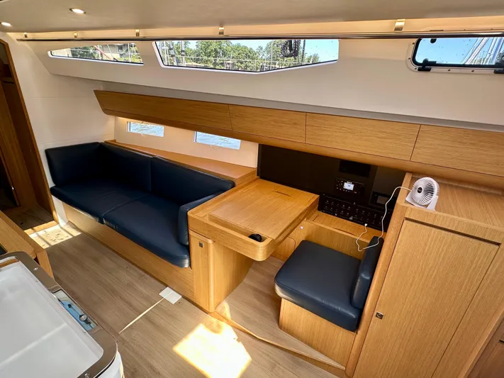  Yacht Photos Pics 2024 J Boats J/40 interior with sleek wood finish and comfortable seating.