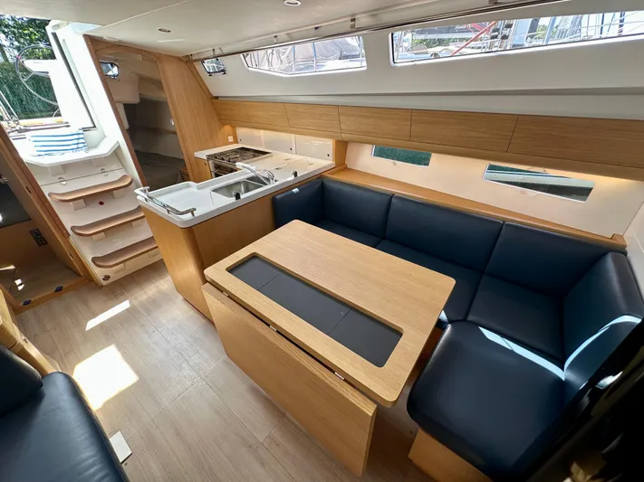  Yacht Photos Pics 2024 J Boats J/40 interior with modern kitchen and cozy seating area.