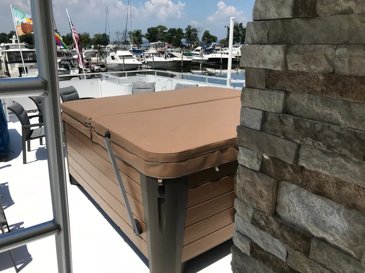 St. Somewhere Yacht Photos Pics Sumerset 2017 houseboat deck with hot tub and marina view.