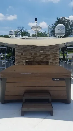 St. Somewhere Yacht Photos Pics 2017 Sumerset houseboat with hot tub and satellite dishes on deck.