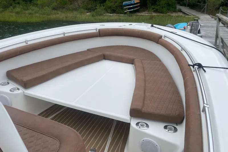 My Buddy Yacht Photos Pics 2016 Buddy Davis 28 Center Console boat with brown cushioned seating and white deck.
