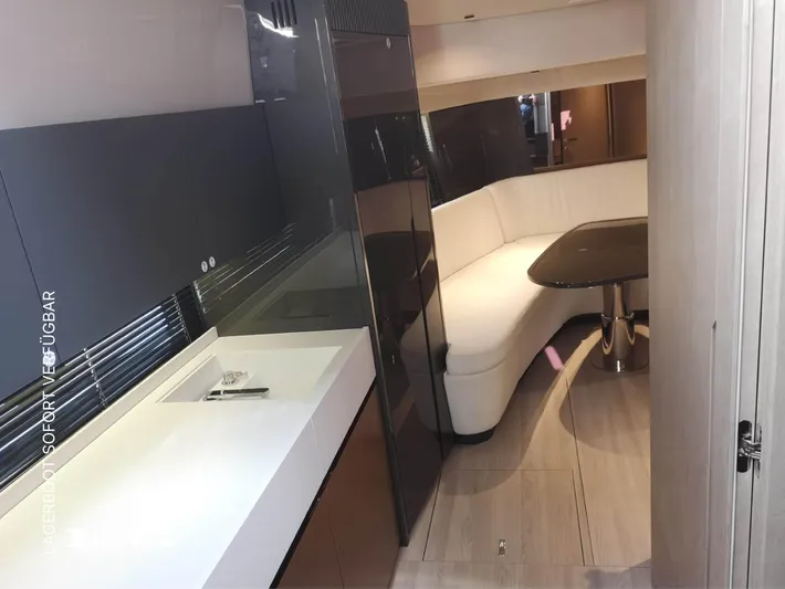  Yacht Photos Pics Luxurious interior of 2025 FIM 440 Regina yacht with modern seating and sleek design.