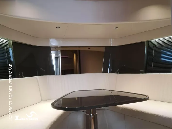  Yacht Photos Pics Interior of 2025 FIM 440 Regina yacht with modern seating and table.