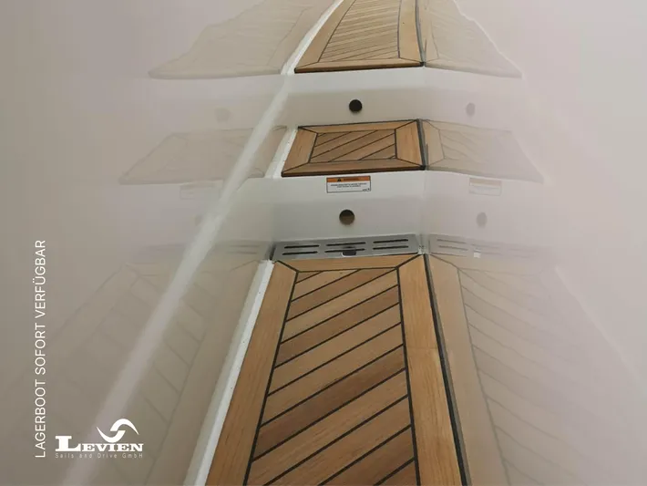  Yacht Photos Pics FIM 440 Regina 2025 boat with sleek wooden deck design, available at Levien.