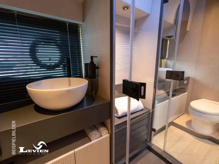  Yacht Photos Pics Modern bathroom interior in FIM 440 Regina yacht, featuring sleek sink and toilet design, 2025 model.
