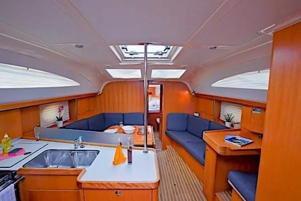 Aventura Yacht Photos Pics Interior of 2008 Elan Impression yacht with modern kitchen and seating area.