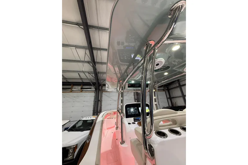  Yacht Photos Pics 2021 Mag Bay 33 CC boat interior with sleek design and modern controls.