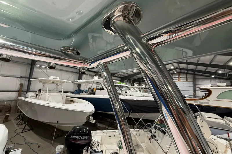  Yacht Photos Pics Interior view of a 2021 Mag Bay 33 CC in a boat storage facility.