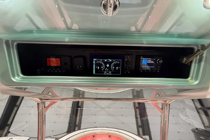  Yacht Photos Pics 2021 Mag Bay 33 CC dashboard with modern navigation and control systems.
