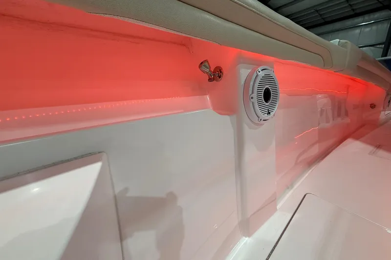  Yacht Photos Pics 2021 Mag Bay 33 CC boat interior with red LED lighting and speaker.
