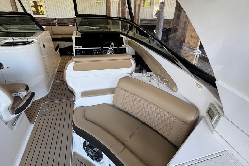  Yacht Photos Pics Interior of 2020 Sea Ray SLX 350 boat with luxurious seating and modern dashboard.