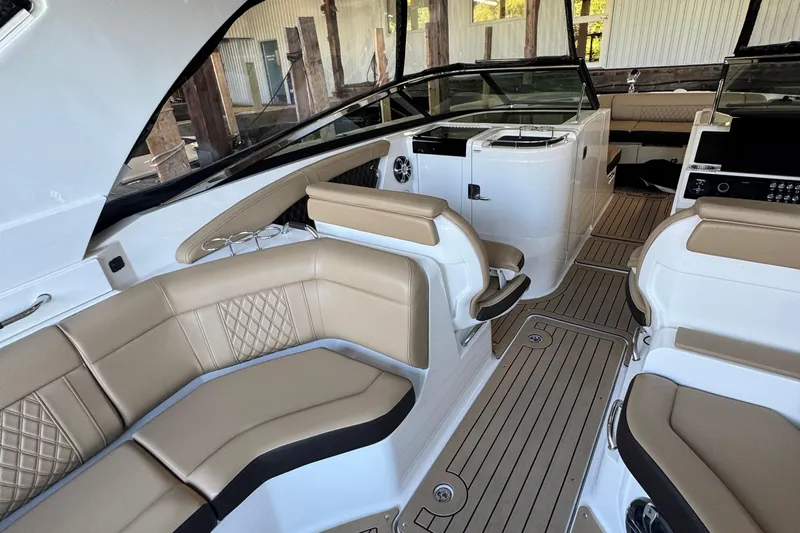  Yacht Photos Pics 2020 Sea Ray SLX 350 interior with luxurious tan seating and sleek design.