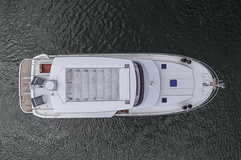 Horizon IV Yacht Photos Pics Aerial view of 2020 Beneteau Swift Trawler 47 on water.