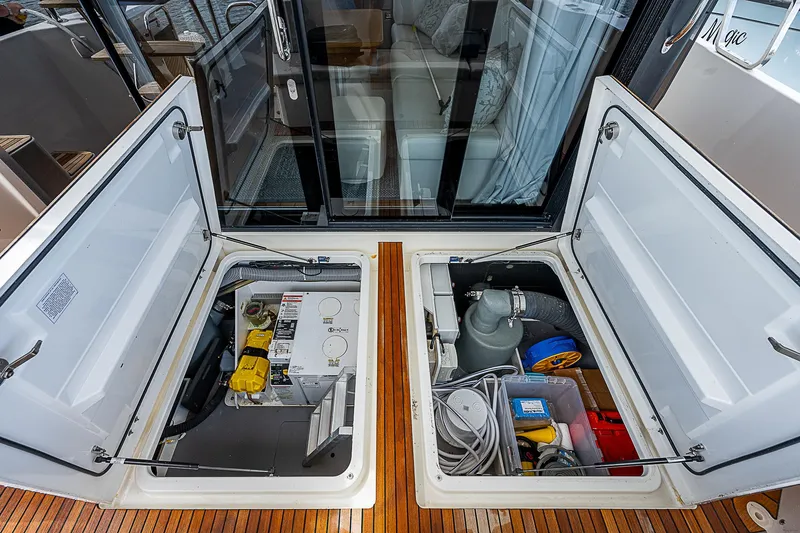 Horizon IV Yacht Photos Pics 2020 Beneteau Swift Trawler 47 storage compartments with equipment and supplies.