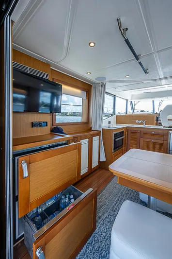 Horizon IV Yacht Photos Pics Interior of 2020 Beneteau Swift Trawler 47, featuring modern kitchen and dining area.