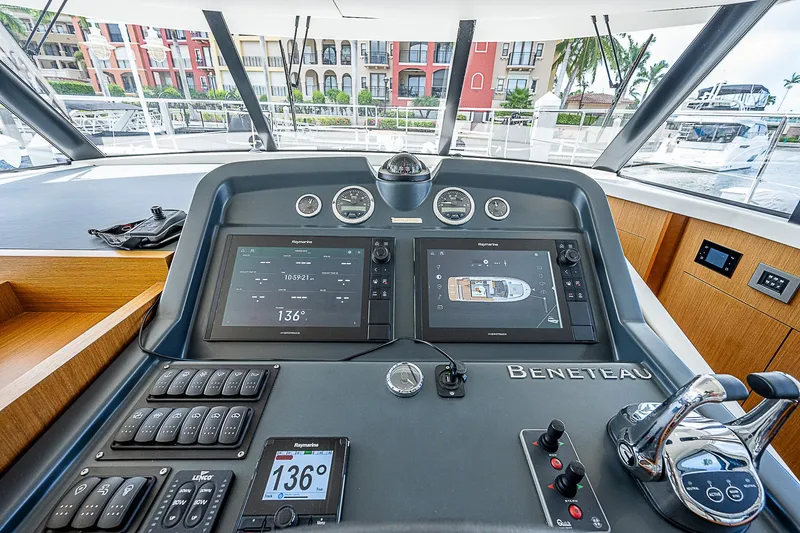 Horizon IV Yacht Photos Pics 2020 Beneteau Swift Trawler 47 helm with navigation screens and controls.