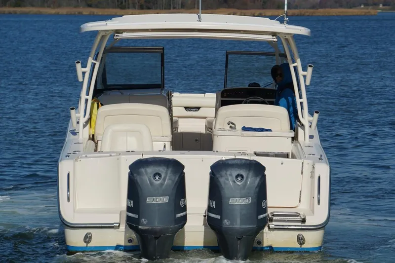 Starr Yacht Photos Pics 2015 Grady-White Freedom 307 boat with dual Yamaha engines on the water.