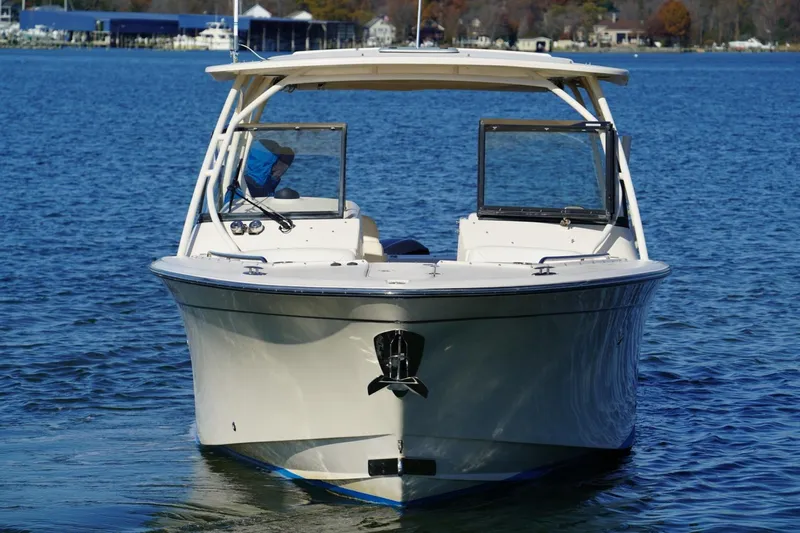 Starr Yacht Photos Pics 2015 Grady-White Freedom 307 boat on calm blue water.