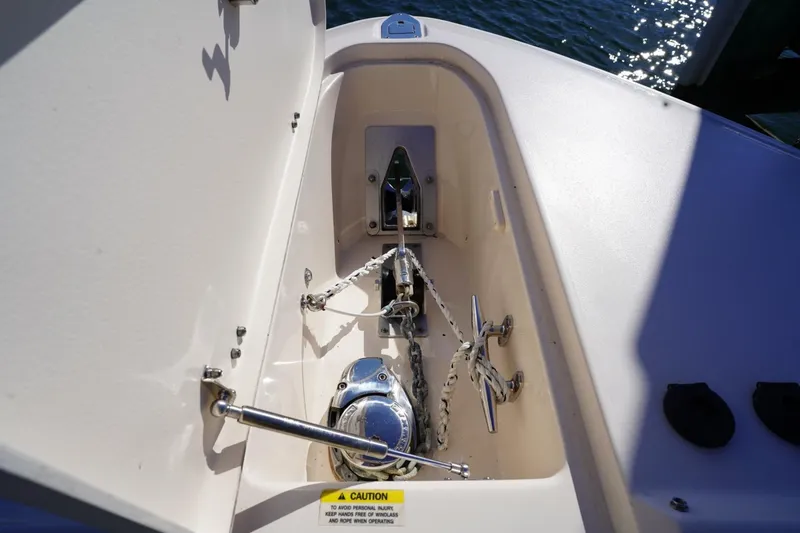 Starr Yacht Photos Pics Anchor compartment of 2015 Grady-White Freedom 307 boat with chain and winch.