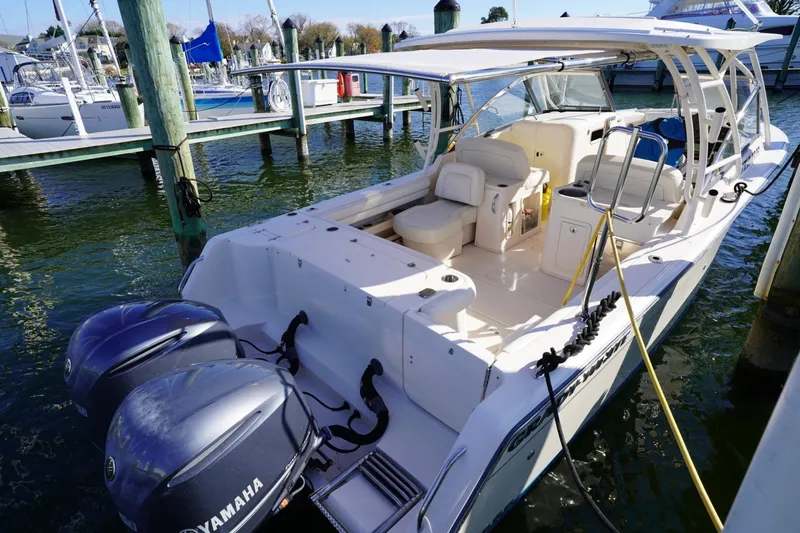 Starr Yacht Photos Pics 2015 Grady-White Freedom 307 boat docked with twin Yamaha engines.