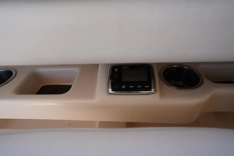 Starr Yacht Photos Pics 2015 Grady-White Freedom 307 boat console with Fusion stereo and cup holders.