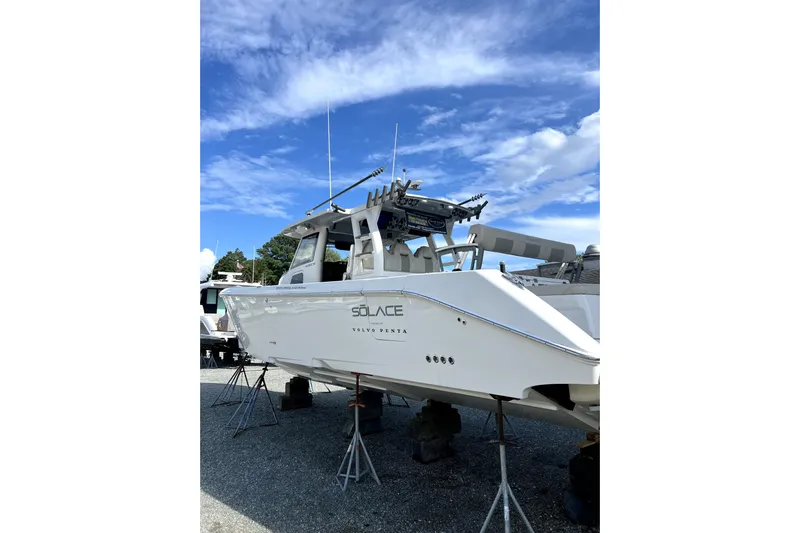 Game Changer Yacht Photos Pics 2022 Solace 41CS boat on stands under a clear blue sky.