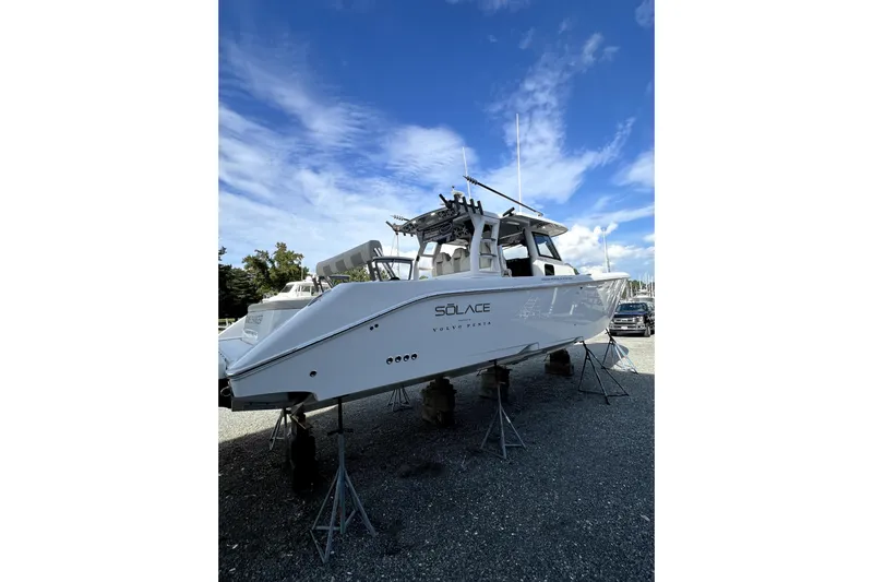 Game Changer Yacht Photos Pics 2022 Solace 41CS boat on stands under a clear blue sky.