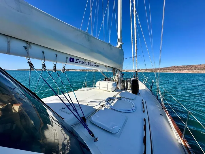  Yacht Photos Pics 1984 Irwin Cutter Ketch sailboat on calm blue waters under clear sky.