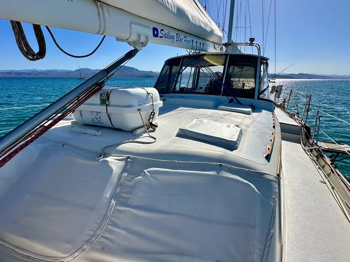  Yacht Photos Pics 1984 Irwin Cutter Ketch sailboat on calm blue waters, showcasing deck and cabin.