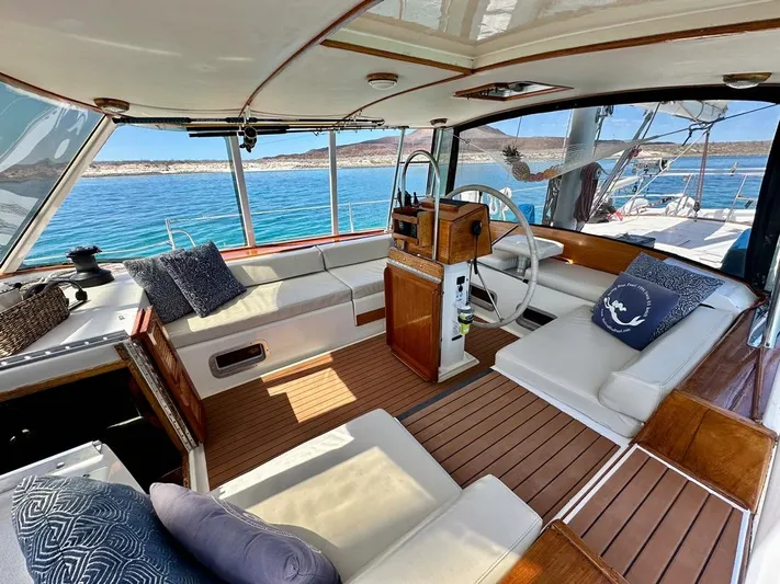  Yacht Photos Pics Luxurious 1984 Irwin Cutter Ketch yacht interior with elegant seating and ocean view.