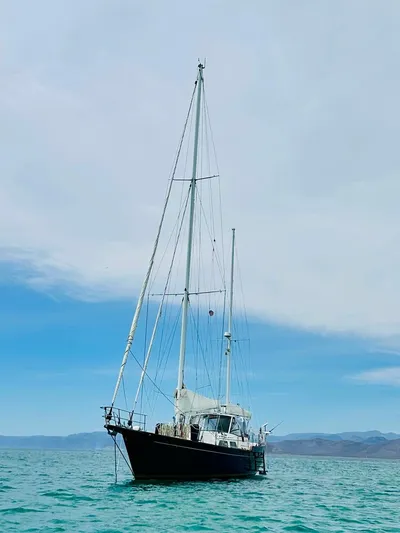  Yacht Photos Pics 1984 Irwin Cutter Ketch sailboat on calm sea under clear sky.
