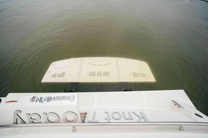  Yacht Photos Pics 2013 Sea Ray 510 Sundancer yacht with swim platform on calm water.