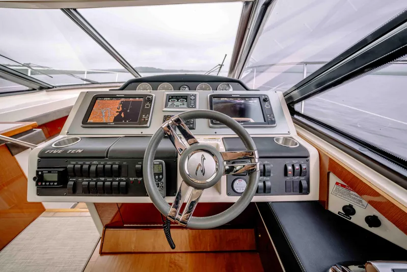  Yacht Photos Pics 2013 Sea Ray 510 Sundancer helm with advanced navigation systems and sleek design.