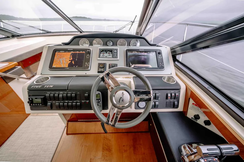  Yacht Photos Pics Helm of 2013 Sea Ray 510 Sundancer with navigation screens and controls.