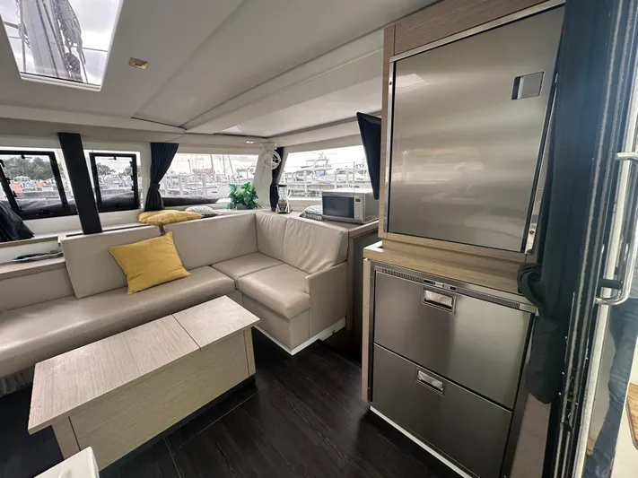 Brave Coquina Yacht Photos Pics Interior of 2020 Fountaine Pajot Lucia 40 catamaran with modern furnishings.