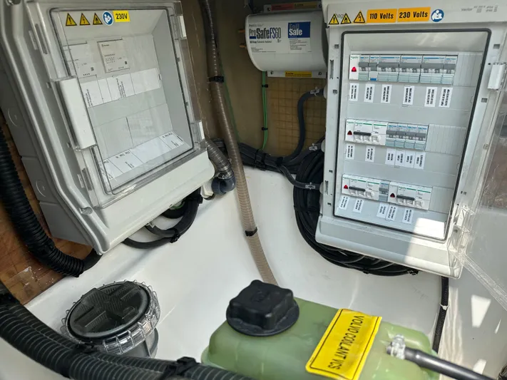 Brave Coquina Yacht Photos Pics Electrical panel and components inside a 2020 Fountaine Pajot Lucia 40 catamaran.