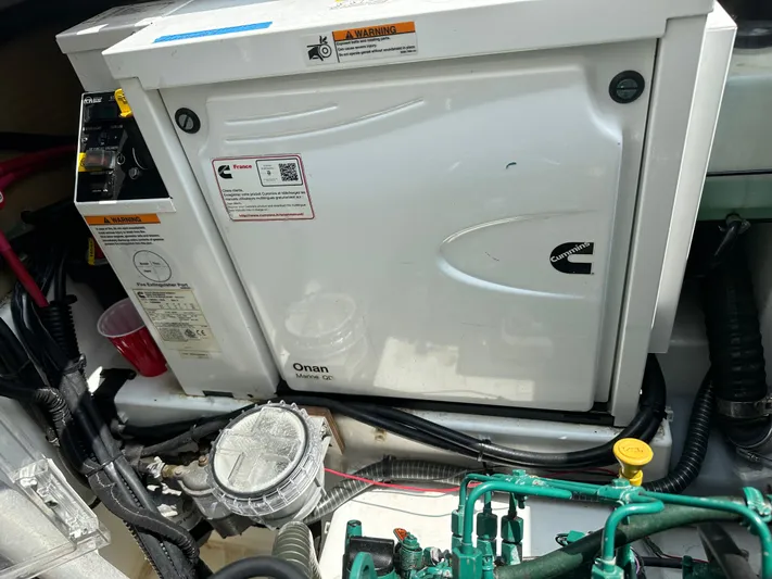 Brave Coquina Yacht Photos Pics Engine compartment of a 2020 Fountaine Pajot Lucia 40 catamaran with Cummins Onan generator.