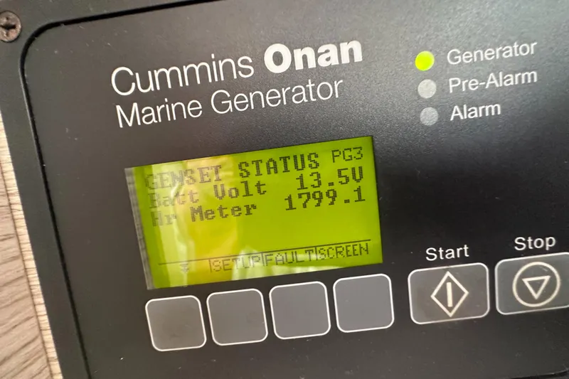 Brave Coquina Yacht Photos Pics Cummins Onan marine generator display on a 2020 Fountaine Pajot Lucia 40.