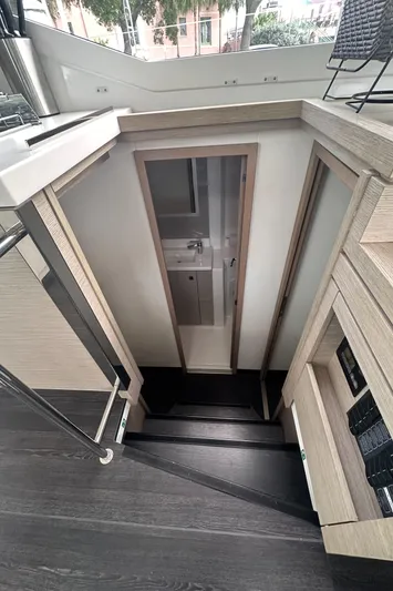 Brave Coquina Yacht Photos Pics Interior stairs of 2020 Fountaine Pajot Lucia 40 catamaran.