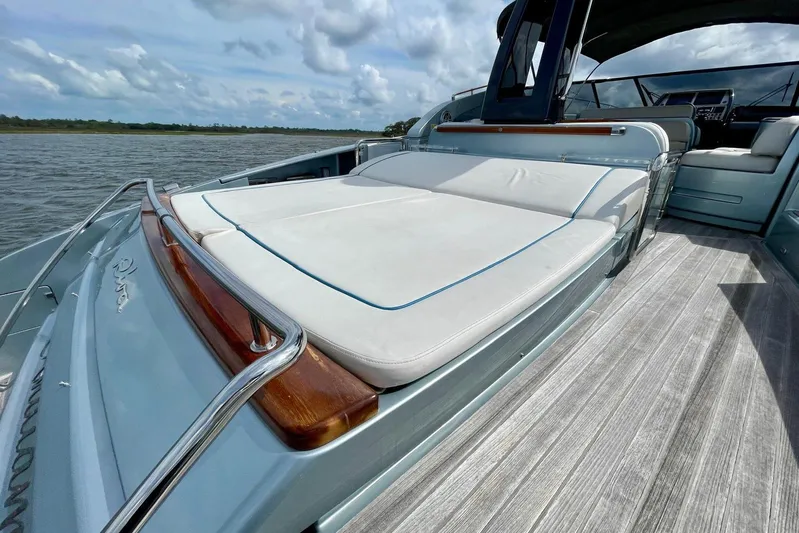 Andiamo Yacht Photos Pics Luxurious 2016 Riva 63 Virtus yacht with spacious sunbathing deck on open water.
