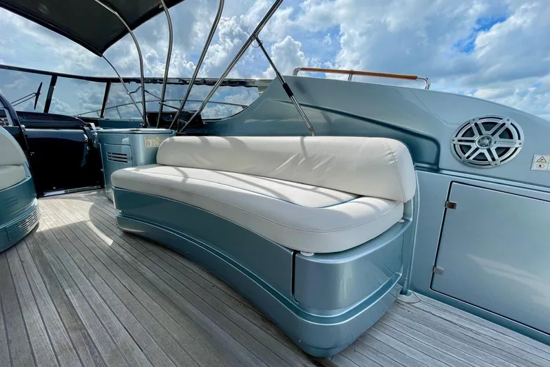 Andiamo Yacht Photos Pics Luxurious seating on 2016 Riva 63 Virtus yacht with sleek design and elegant finishes.