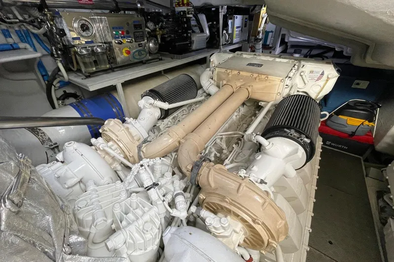 Andiamo Yacht Photos Pics Engine room of a 2016 Riva 63 Virtus yacht, showcasing complex machinery and components.