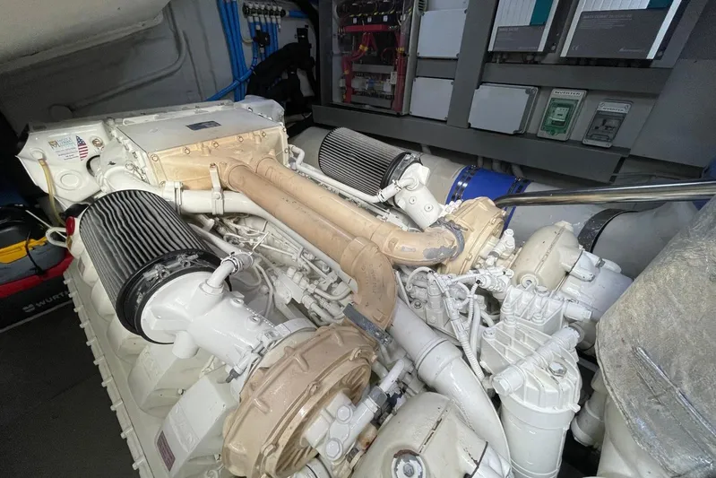 Andiamo Yacht Photos Pics Engine room of a 2016 Riva 63 Virtus yacht, showcasing mechanical components.