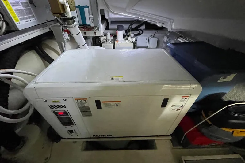 Andiamo Yacht Photos Pics Engine room of 2016 Riva 63 Virtus with Kohler generator.