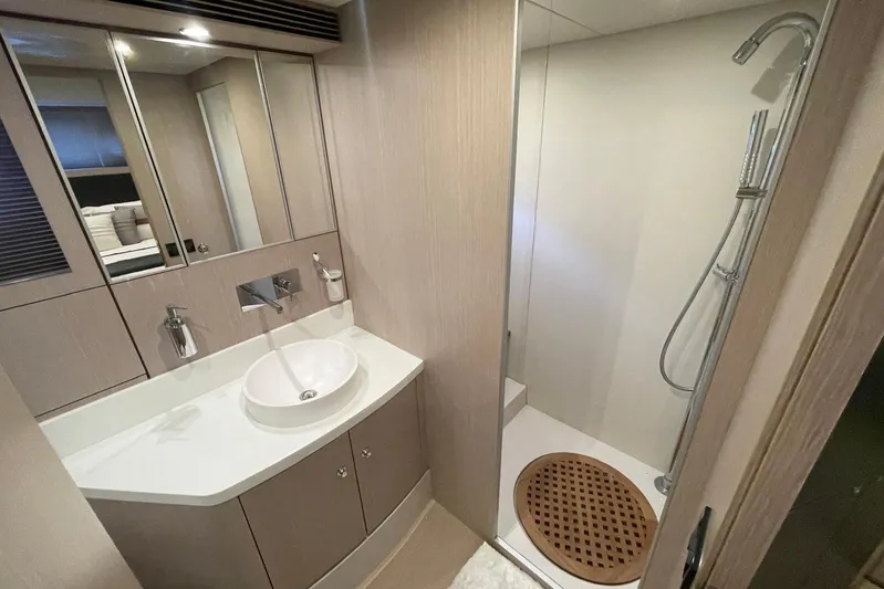 Andiamo Yacht Photos Pics Luxurious bathroom in 2016 Riva 63 Virtus yacht with modern fixtures and shower.