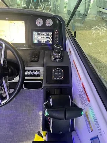  Yacht Photos Pics 2024 Formula 310 Bowrider OB dashboard with advanced navigation and control systems.