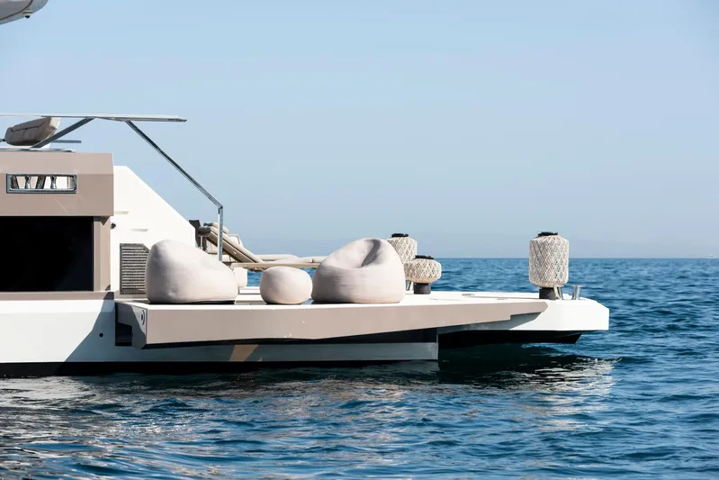  Yacht Photos Pics Luxury Mazu Yachts 92 DS, 2025 model, with elegant deck seating on calm sea.
