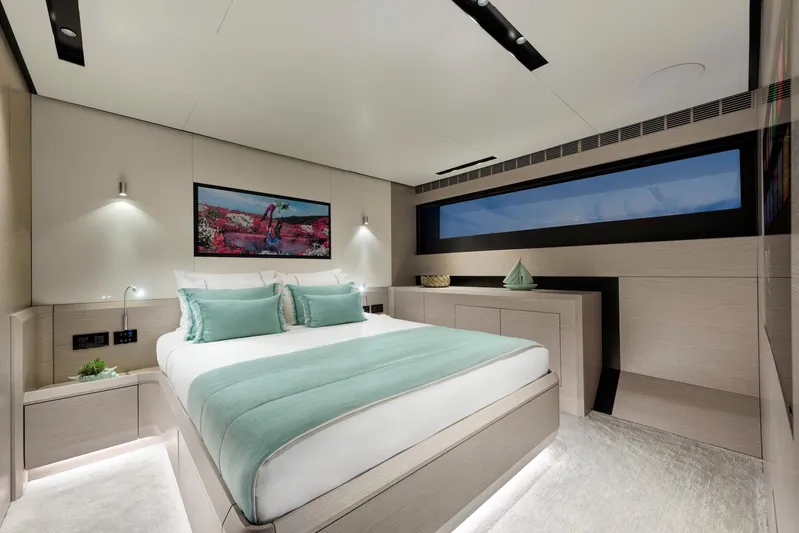  Yacht Photos Pics Luxurious bedroom interior of 2025 Mazu Yachts 92 DS with modern design and large window.