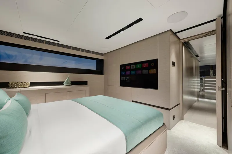  Yacht Photos Pics Luxurious bedroom interior of 2025 Mazu Yachts 92 DS with modern design and large window.