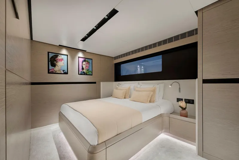  Yacht Photos Pics Luxurious bedroom interior of 2025 Mazu Yachts 92 DS with modern decor and artwork.